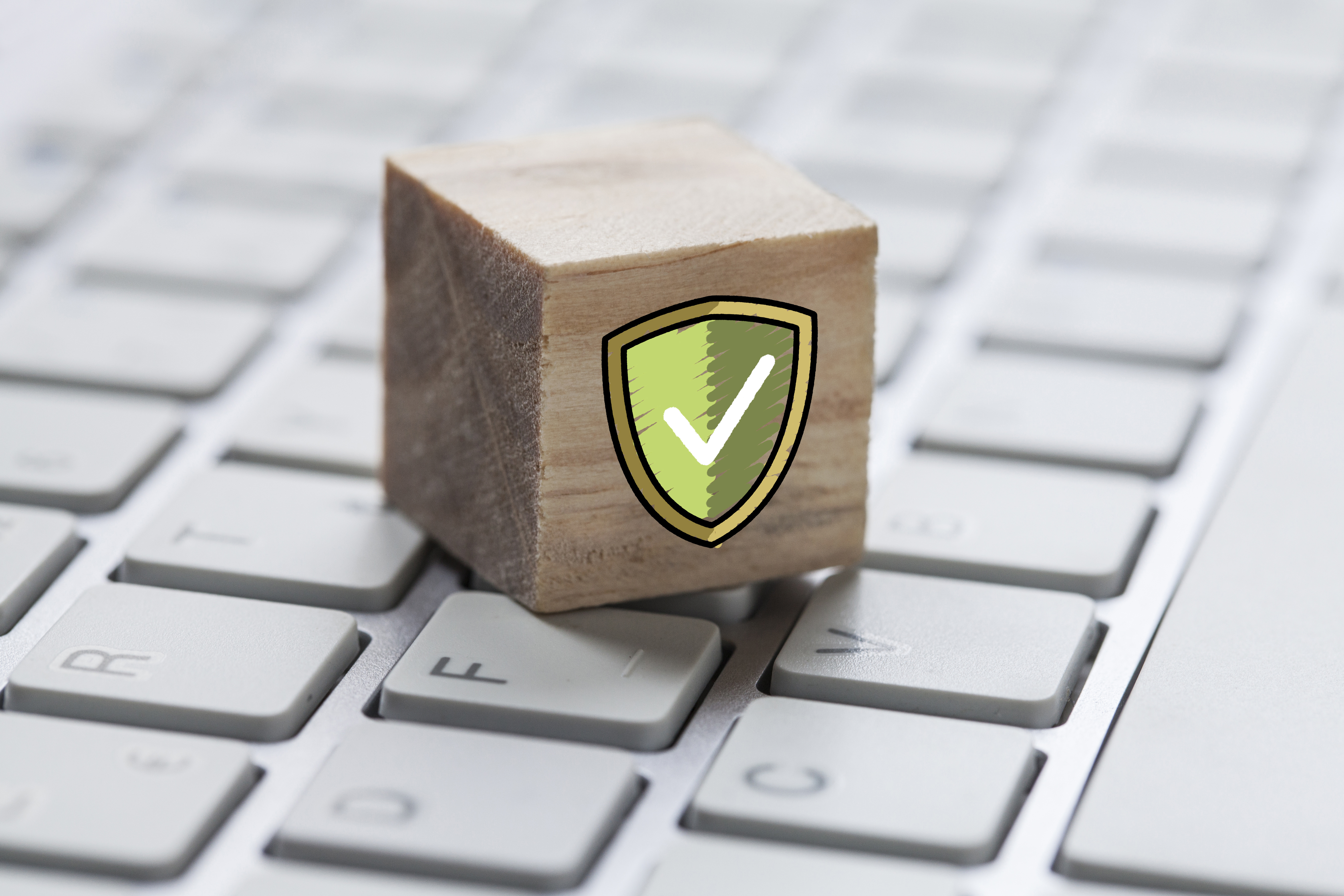 Skjoldsymbol på tastatur som illustrerer beskyttelse av data